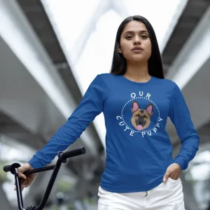 German Shepherd long-sleeve shirt mockup of a woman standing next to her bike