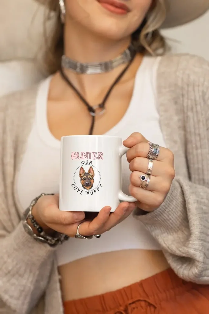 German Shepherd Personalised Coffee Mug 3 Mockup of a woman in a boho outfit holding an 11 oz personalised German Shepherd mug