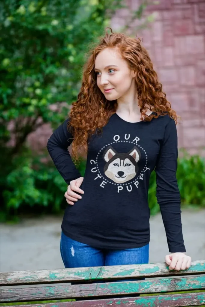 Husky Long Sleeve Shirt mockup navy color featuring a curly haired woman 