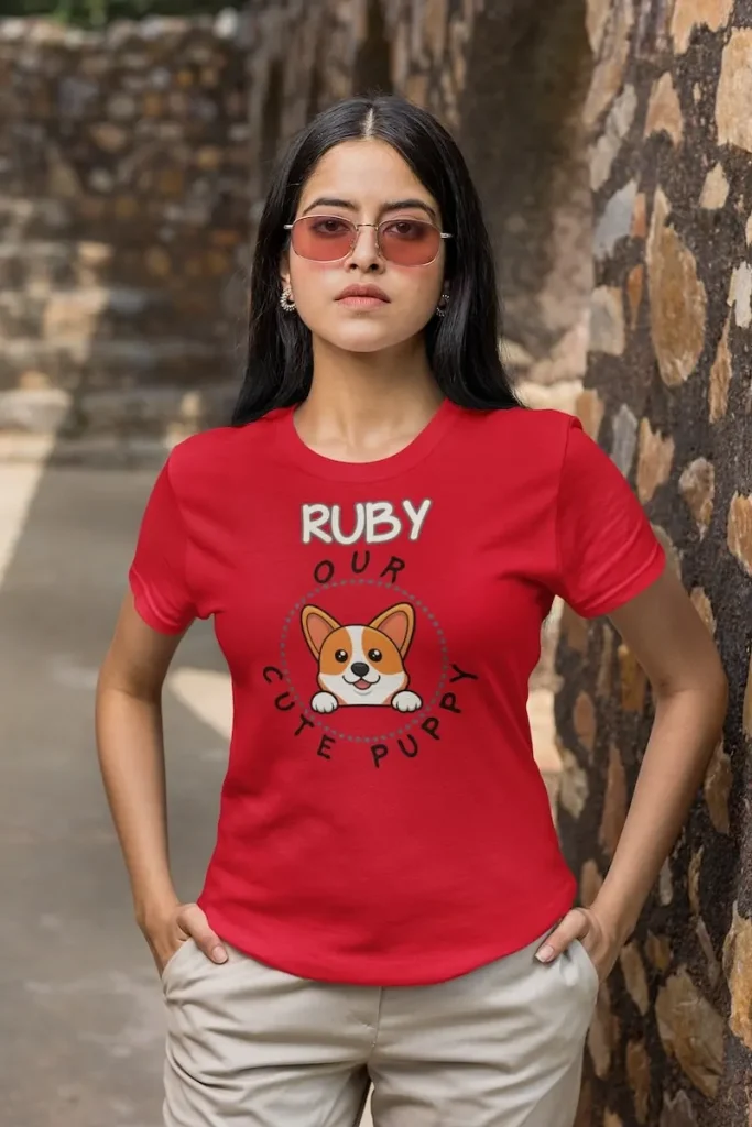 Welsh Corgi T-Shirt, Unisex - Customizable 6 Welsh Corgi t-shirt mockup featuring a serious woman with sunglasses with her hands in her pockets
