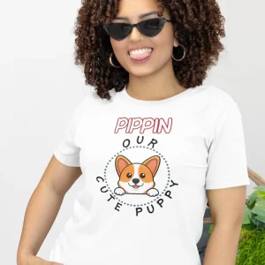 Welsh Corgi t-shirt mockup featuring a smiling woman with curly hair