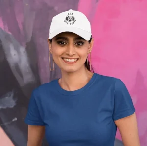 Dalmatian-dat-hat-mockup-featuring-a-smiling-woman-posing-against-a-colorful-wall