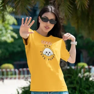 Our Cute Puppy 15 Bichon t-shirt mockup of a stylish woman standing in the street