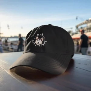Mockup of a Husky dad hat placed on a table at sunset