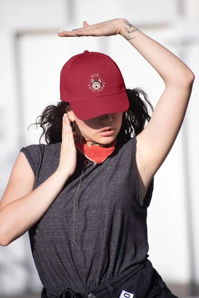 Husky Dad Hat - Classic Dad Cap 4 Mockup of a woman with a Husky dad hat posing in the street