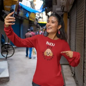 Our Cute Puppy 6 Poodle long-sleeve shirt mockup featuring a woman taking a selfie in an alley