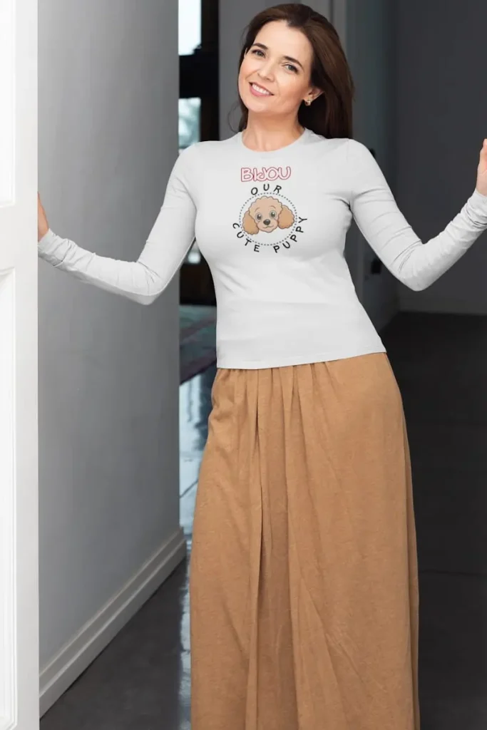 Exclusive Poodle Long-Sleeve Shirt, Unisex 5 Poodle long-sleeve shirt mockup of a middle-aged woman posing at her house